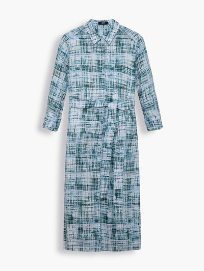 Linen Midi Shirt Dress in Foliage Green Abstract Print. Cut from a foliage green, abstract print in fluid, light-weight linen. A relaxed tailoring cut that is comfortable to wear throughout the day. This dress itself is a statement piece, wear on it own or with the accompanying sash belt to cinch your frame. 