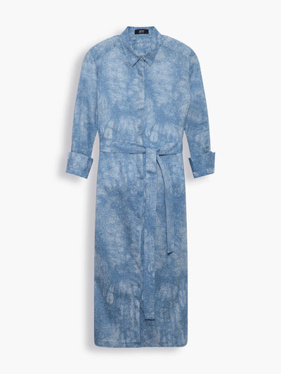 Cotton Midi Shirt Dress in Light Blue Botanical Print. It’s cut from a light-weight jacquard satin fabric with a subtle sheen and a delicate light blue botanical print that goes with almost everything. The dress is tailored to add some femininity to its fluid silhouette. Great for the weekend or as a getaway dress or cinch the waist for a more workwear style.