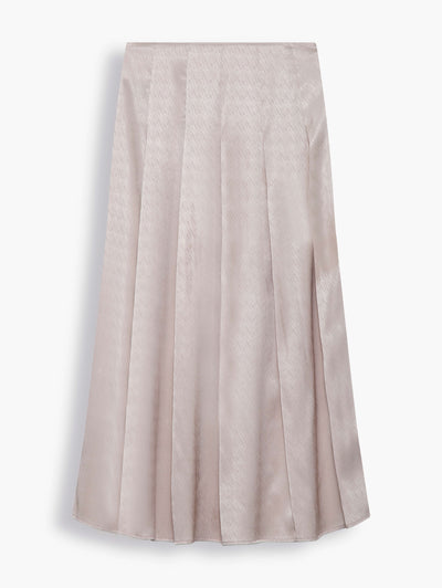 Pleated Midi Skirt in Champagne. Comes in a soft neutral shade that goes with anything, it’s pleated for movement and falls to an elegant midi length, creating a lovely swish as you walk. Wear it with the matching shirt or simply pair it with a T-shirt for the weekend.